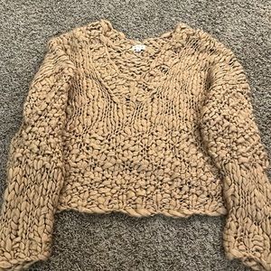 Oversized women’s tan sweater